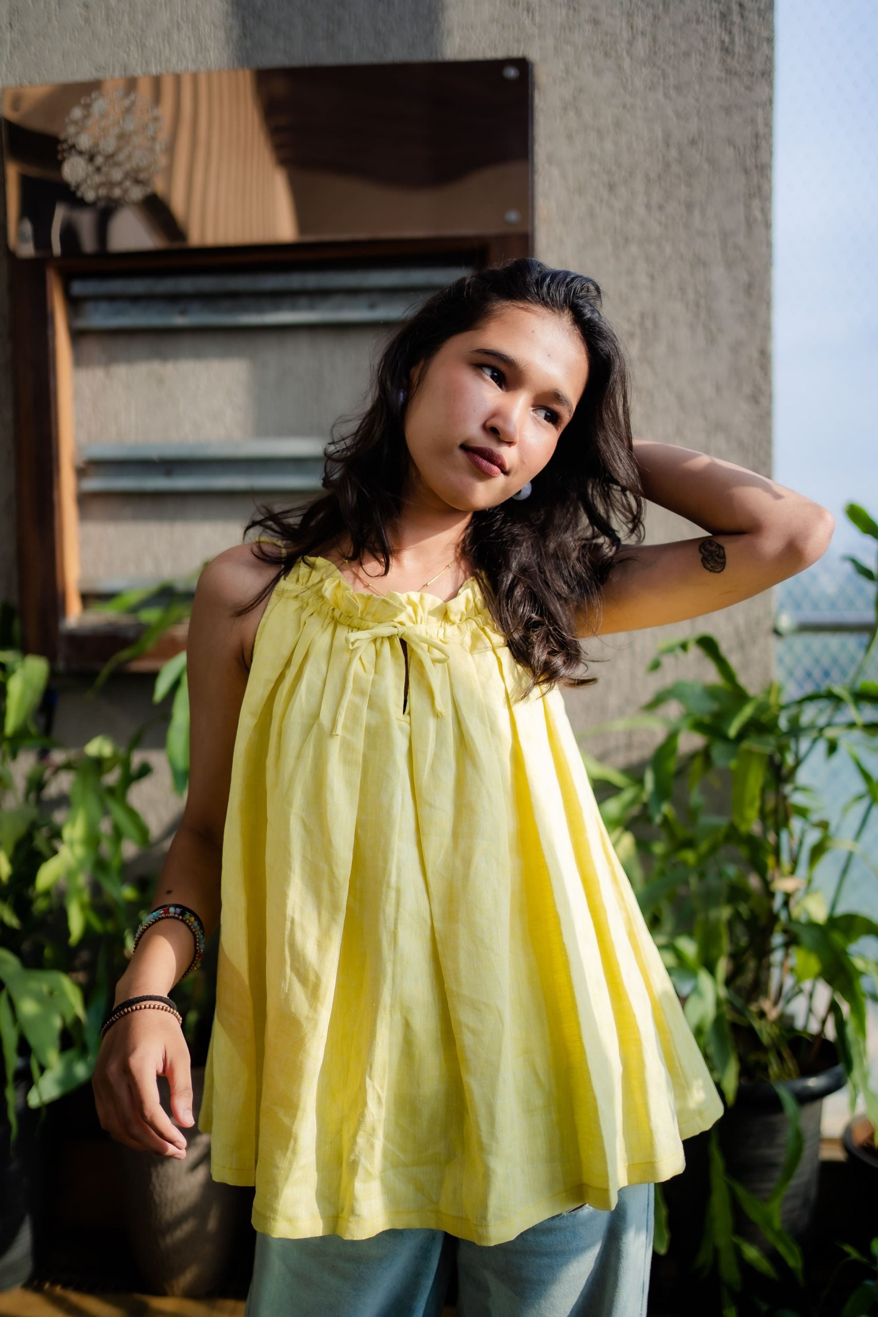 Pleated swing top for women in flowy silhouette